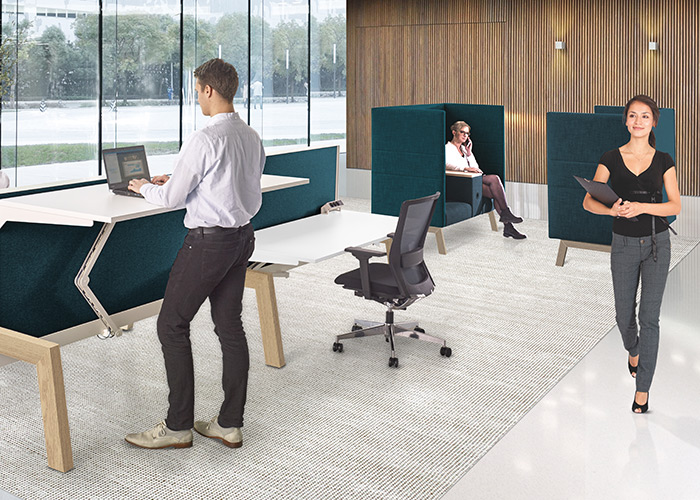 Ergonomische kantoorinrichting met zit-sta werkplekken Ergonomische kantoorinrichting met zit-sta werkplekken